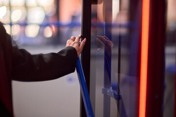 The Night Bus Ride An Experience of Waiting to Depart Under Vibrant Neon Lights at Dusk