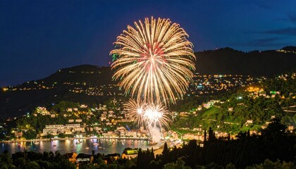 Fireworks over a coastal town at night (1)