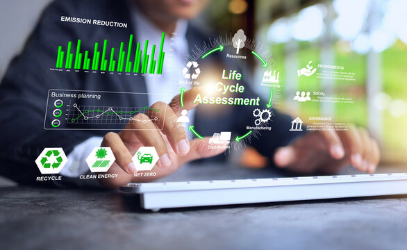 Life cycle assessment LCA concept with businessman tracking on manufacturing the products cycle footprint from start to end process for zero carbon dioxide within 2050