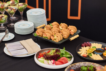 An Elegant Assortment of Gourmet Desserts and Savory Snacks Beautifully Arranged on Table