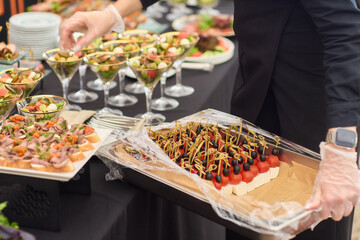 An Elegant Assortment of Gourmet Desserts and Savory Snacks Beautifully Arranged on Table