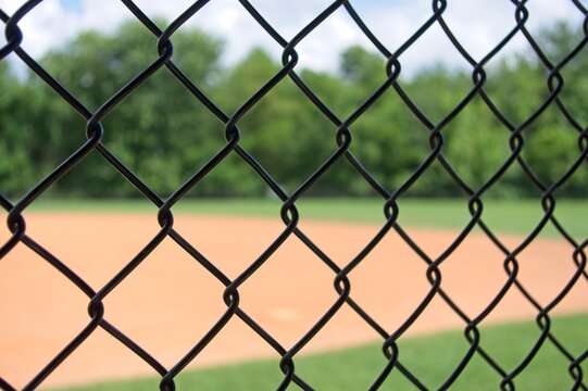 Chain link fence pattern with blurred background