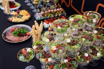 An Elegant Assortment of Gourmet Desserts and Savory Snacks Beautifully Arranged on Table