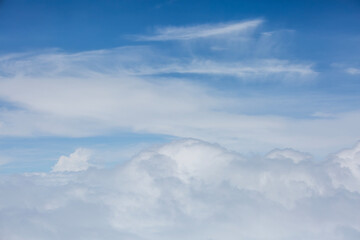 Aerial View of Sea of Clouds and Blue Sky Landscape Background​

