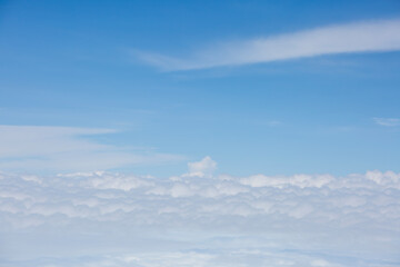 Fototapeta premium Aerial View of Sea of Clouds and Blue Sky Landscape Background​