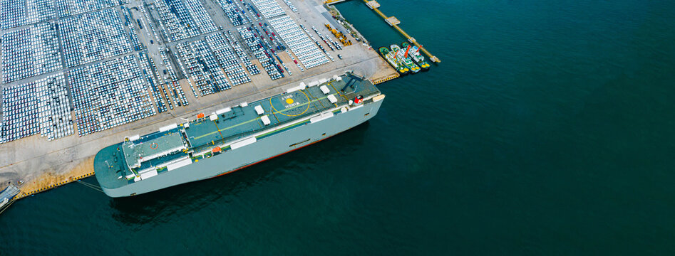 Aerial view ro-ro ship, Cargo ship transportation of business logistic sea freight, New Cars produced by year up in the port for Cargo ship and Cargo import-export around in the world