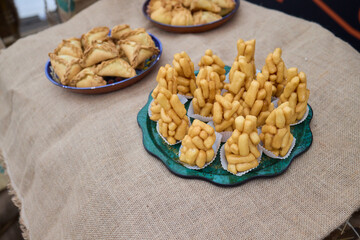 Delicious Traditional chuck chuck Pastries Beautifully Stacked in a Decorative Platter Ready for Enjoyment