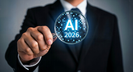Businessman Analyzing AI Binary Data Concept. Magnifying Glass Focus on Artificial Intelligence,AI-Based Business Decision Analysis for 2026 ,AI -Powered business transformation in 2026 .