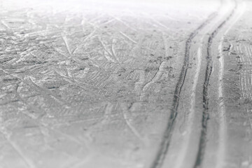 Tracks in the Snow with Texture and Patterns on a Winter Surface