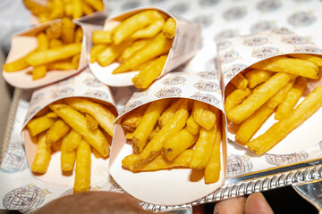 Crispy Golden French Fries Served in Paper Cones