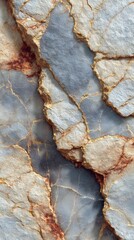 Layers of natural stone with striking patterns and colors in a close-up view showing fine details and textures in daylight