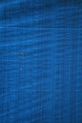 blue texture, abstract background, plastic tarp, tarpaulin, diagonal lines, pattern, fabric texture, industrial material, vivid blue, textile surface, geometric pattern, light and shadow, creative bac