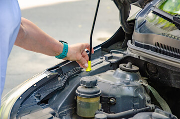 Securing Car Hood with Latch in Engine Compartment