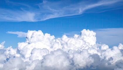 Fluffy clouds against a vivid blue sky