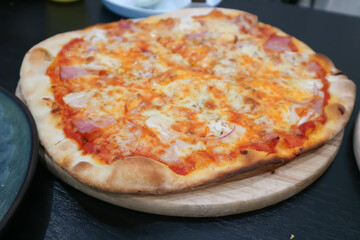 ham and cheese pizza or cheese pizza or Hawaiian pizza or Italian pizza