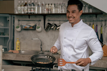 A cheerful chef joyfully cooking in a modern kitchen, showcasing culinary skills and passion for...