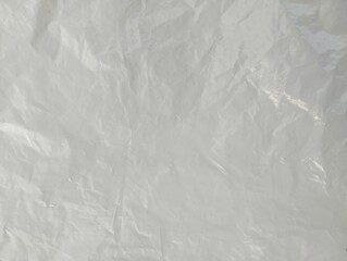 Abstrack crumpled white plastic bag texture and background	
