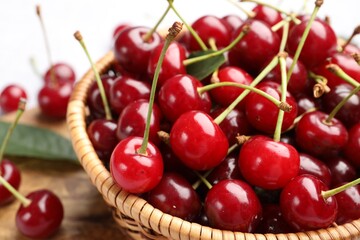 Fresh ripe cherries on light table, closeup