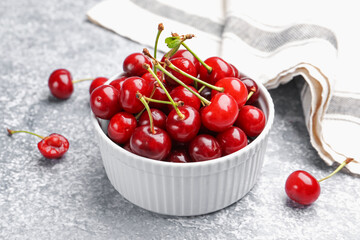 Fresh ripe cherries on light table, closeup