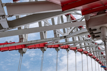 steel beams is bolted down. Close-up shows the connection of the metal powerful straight crossbar,...