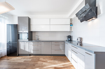Modern Kitchen Interior with Bright Lighting and Sleek Contemporary Design