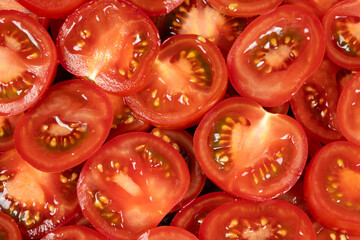 Top View of Juicy Tomato Rings. Vibrant Food Texture Background.