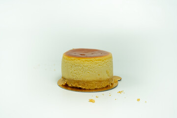 Delicious Mini Cheesecake With Golden Crust on White Background Display