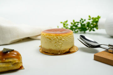 cheesecake concept and props in white studio background