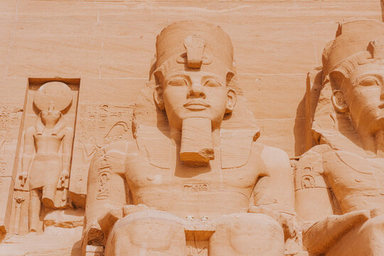 Majestic statues of ramses ii are guarding the great temple of abu simbel