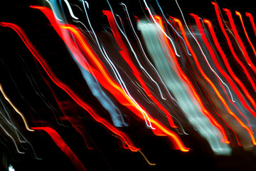 Abstract background with bright, multicolored light rays in motion. Copyspace concept. Photo effect.