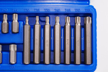 part of A set of single-sided chrome steel bits in a blue plastic box