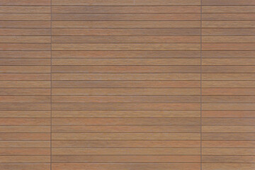 The wooden wall of the building, covered with horizontal panels, creates a textured and modern...