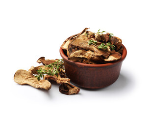 Pieces of dried mushrooms and rosemary in bowl isolated on white