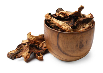 Pieces of dried mushrooms in bowl isolated on white