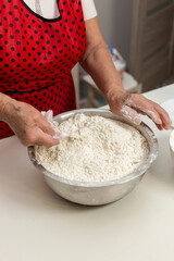 Elderly Woman Making Cookie Dough
