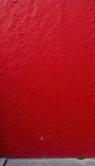 Obraz premium Deep crimson wall, textured with varying shades of red , backdrop, photographic
