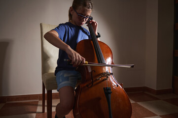 Child Practicing Cello at Home in Quiet Room