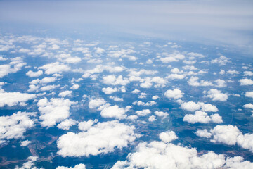 beautiful thick clouds in the sky from the height of the plane