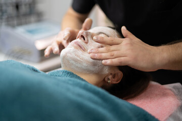 girl at a cosmetologist during treatment procedures