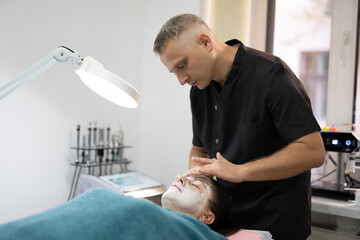 girl at a cosmetologist during treatment procedures