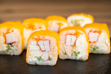 delicious traditional Japanese sushi and rolls on a plate