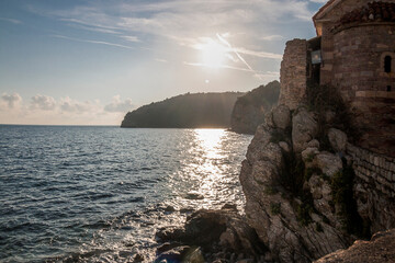 fortress on a cliff on the seashore in the sunshine