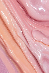 The abstract background features glossy paint strokes in pastel colors, blended in smooth layers with a shimmering texture, enhanced by soft lighting.