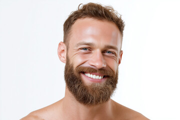 Obraz premium Smiling man with beard and blue eyes showing healthy skin and joyful expression after skincare treatment on white background