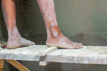 Construction workers on scaffolding