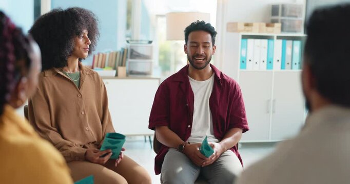 Happy people, discussion and convention with support group for counseling or rehabilitation. Man, speaker and talking with community for mental health, therapy session or team social in workplace