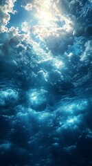 Sunlight Piercing Through Ocean Water with Clouds Reflection