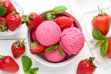 Tasty sorbet with strawberries and mint served on white wooden table, flat lay