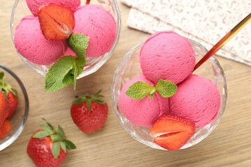 Refreshing sorbet, strawberries and mint on wooden table, flat lay