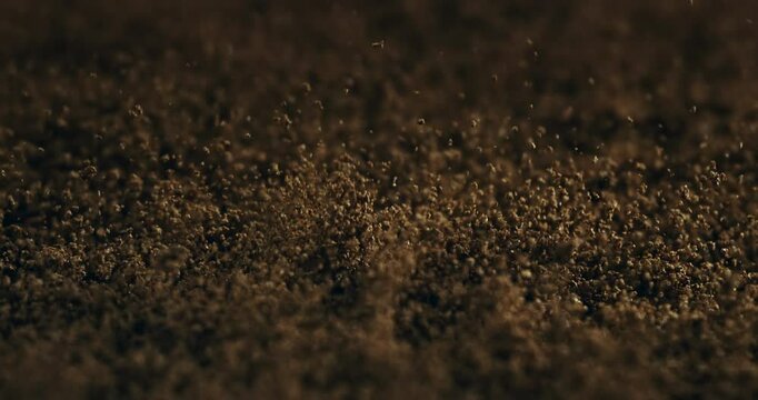 Close-Up of Fresh Ground Coffee in Slow Motion Aromatic Brown Granules, Rich Texture, and Bold Roast Perfect for Morning Rituals, Espresso Shots, and Caffeine-Lovers' Visual Inspiration at 1000 fps